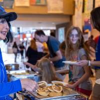 President Mantella serving breakfast